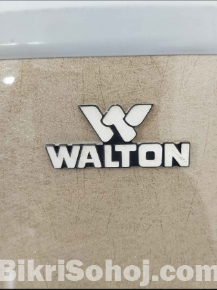 Walton fridge for sale with free establizer